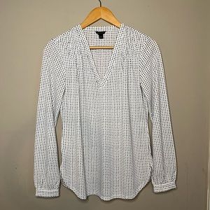 White / black polka dot blouse.